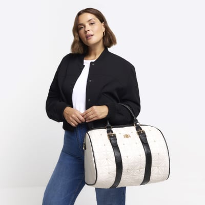 Cream quilted pearl travel bag River Island