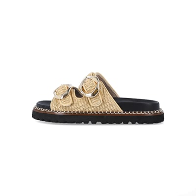 https://images.riverisland.com/is/image/RiverIsland/cream-raffia-double-buckle-sliders_755946_360_05?$ProductListingPortrait$