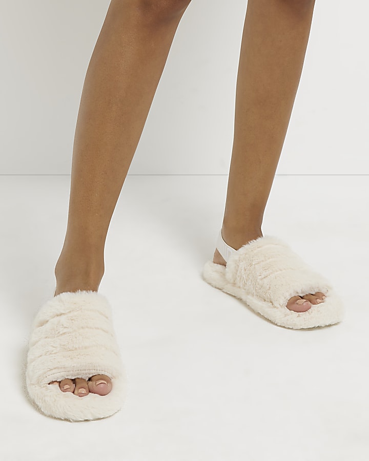 Cream RI monogram faux fur slippers
