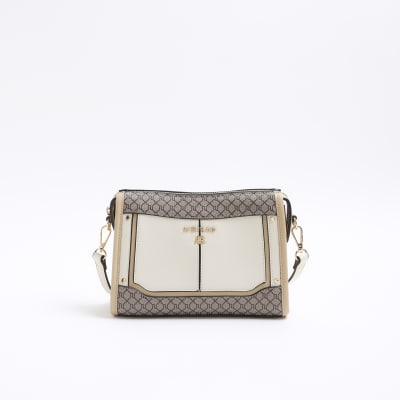 Cream RI monogram panel cross body bag | River Island