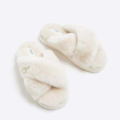 Cream sheepskin crossed slippers | River Island