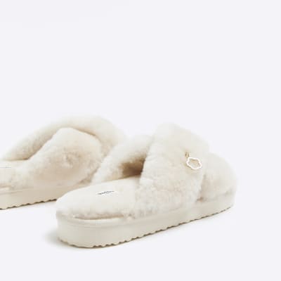 Cream sheepskin crossed slippers River Island