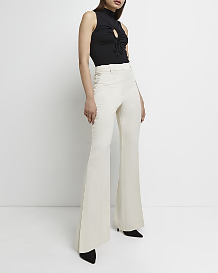 Cream side split flared trousers