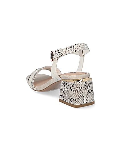 360 degree animation of product Cream snake printed block heel sandals frame-7