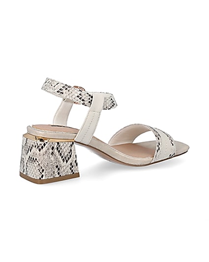 360 degree animation of product Cream snake printed block heel sandals frame-13