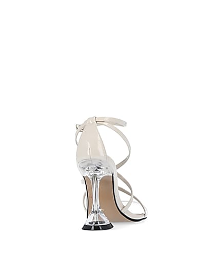 360 degree animation of product Cream strappy perspex heels frame-10