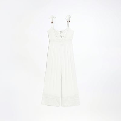 Cream tie front cut out jumpsuit River Island