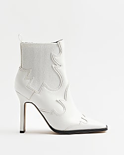 Cream western heeled ankle boots