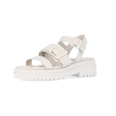 360 degree animation of product Cream wide fit buckle dad sandals frame-1