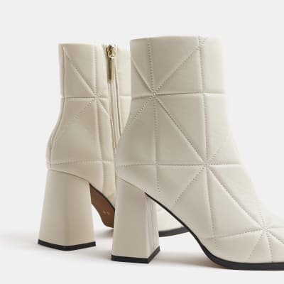 Cream wide fit quilted heeled ankle boots River Island