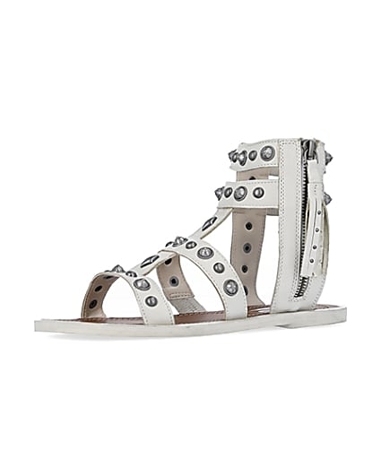 360 degree animation of product Cream wide fit studded gladiator sandals frame-1