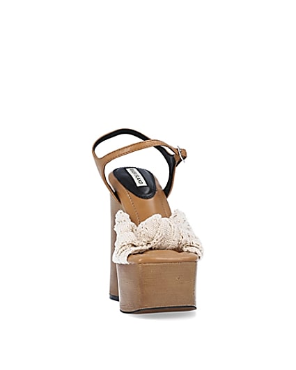 360 degree animation of product Cream wooden platform heeled sandals frame-20