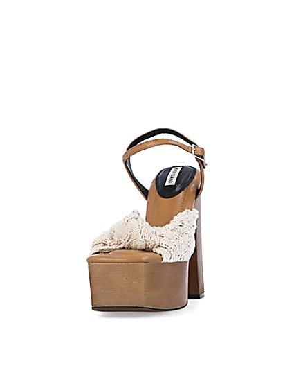 360 degree animation of product Cream wooden platform heeled sandals frame-22