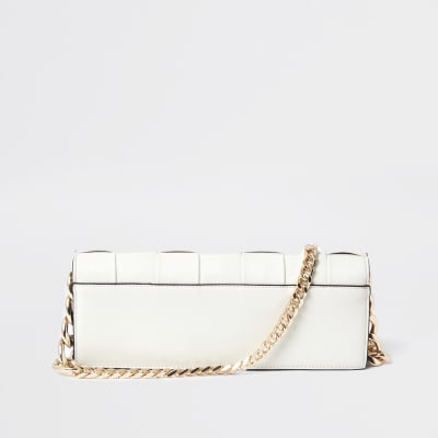 Cream woven baguette clutch bag