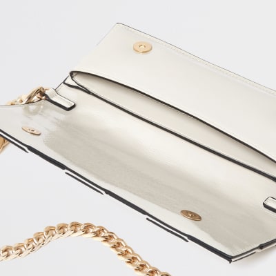 Cream woven baguette clutch bag