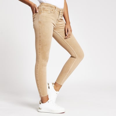 beige jeans skinny