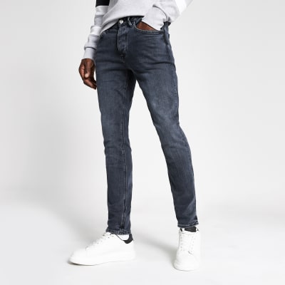Dark blue Dylan slim fit jeans | River Island