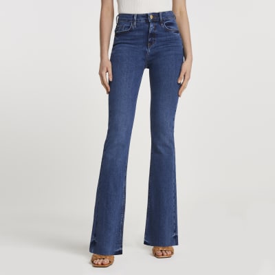 Dark blue mid rise flare jeans | River Island