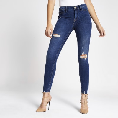 Dark blue Molly ripped mid rise jeggings | River Island