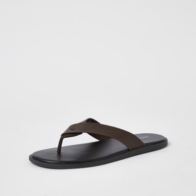 dark brown leather flip flops