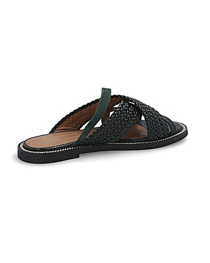 360 degree animation of product Dark green woven strap flat mules frame-13