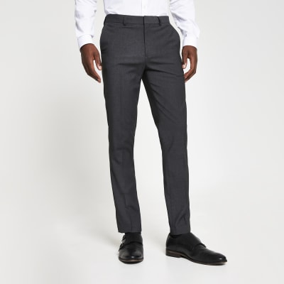 tight fit black trousers