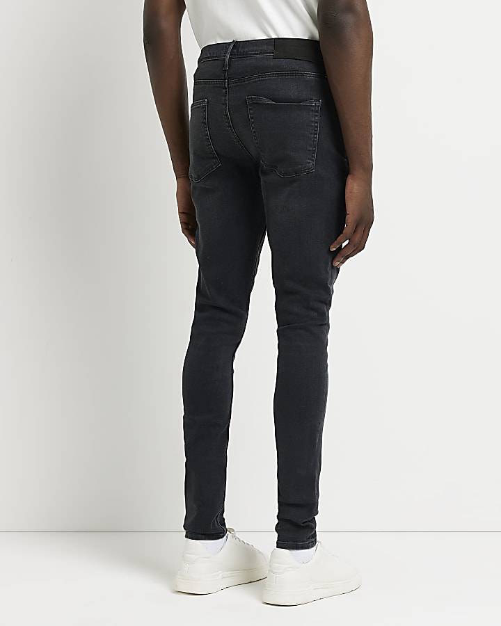 Dark Grey spray on skinny fit faded jeans