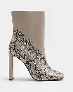 Ecru animal print heeled ankle boots