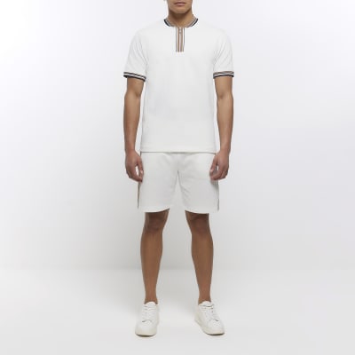 Ecru slim fit textured taped polo shirt