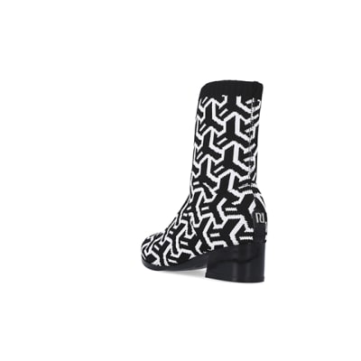 360 degree animation of product Girls Black Abstract Heeled sock Boots frame-7
