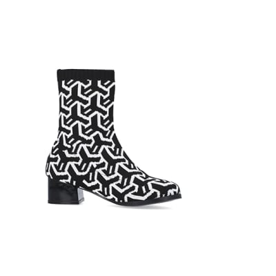 360 degree animation of product Girls Black Abstract Heeled sock Boots frame-16