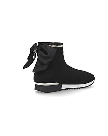 360 degree animation of product Girls black bow knit high top trainers frame-13