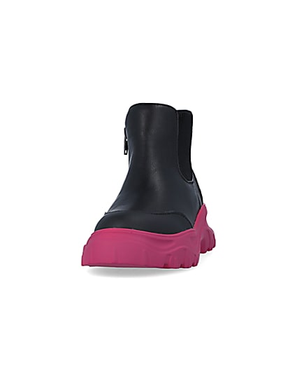 360 degree animation of product Girls Black Chunky Pink Sole Ankle Boots frame-22