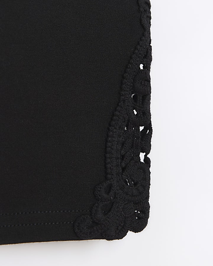 Girls black crochet hem leggings