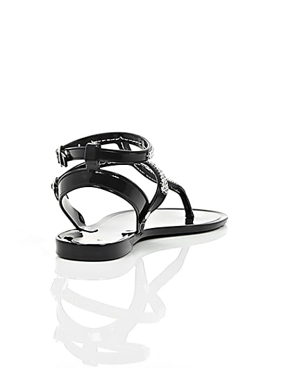 360 degree animation of product Girls black diamanté jelly sandals frame-14
