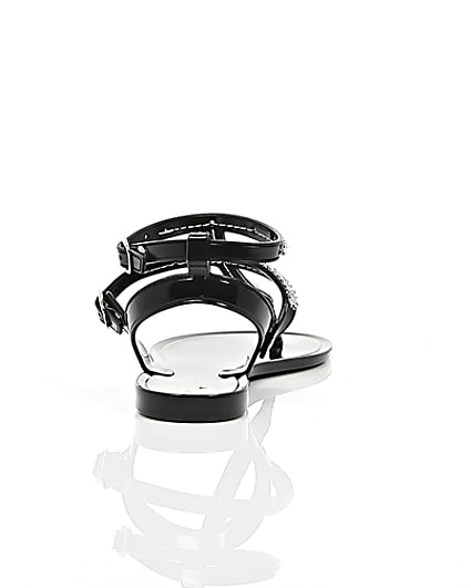 360 degree animation of product Girls black diamanté jelly sandals frame-15