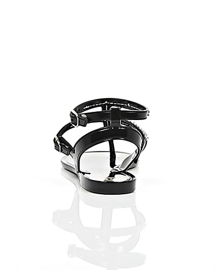 360 degree animation of product Girls black diamanté jelly sandals frame-16