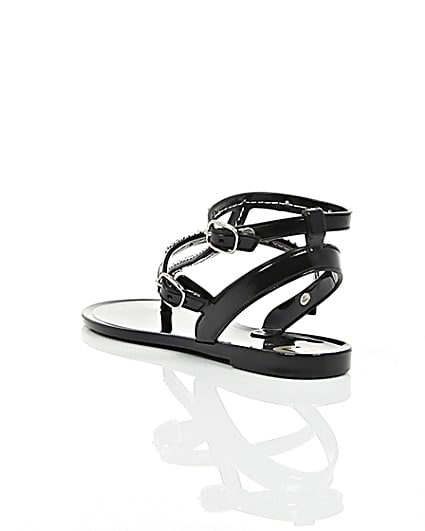 360 degree animation of product Girls black diamanté jelly sandals frame-18