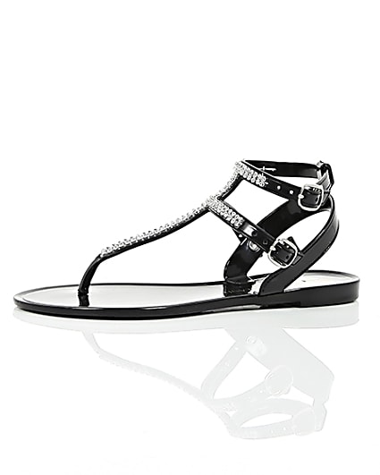 360 degree animation of product Girls black diamanté jelly sandals frame-23