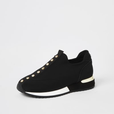 girls pull on trainers