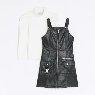 Girls black faux leather pinafore dress River Island