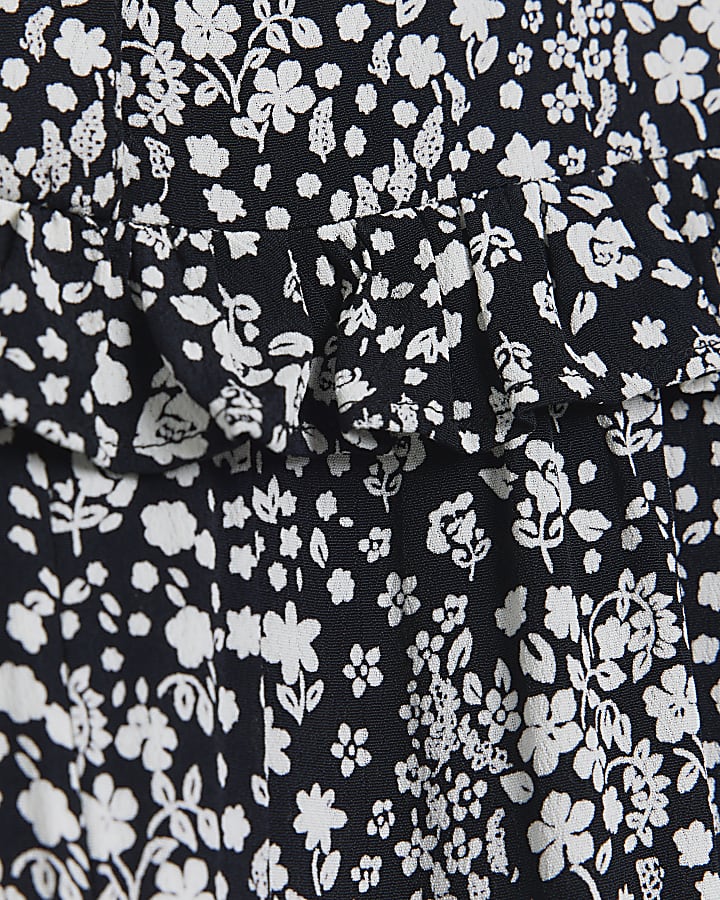 Girls black floral print jumpsuit