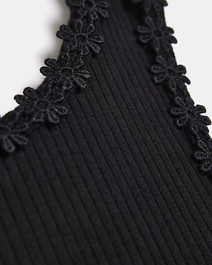 Girls black flower trim vest top