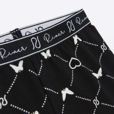 Girls black monogram print cycling shorts