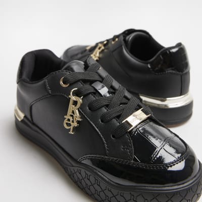 Girls black patent lace up plimsolls