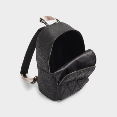 Girls black quilted monogram backpack River Island