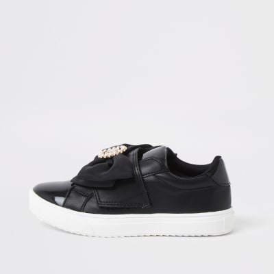 Girls black RI bow trainers | River Island