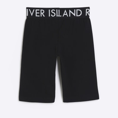 Girls black RI elasticated cycle shorts River Island