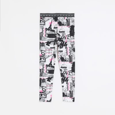 Girls Black RI Newspaper print Leggings River Island