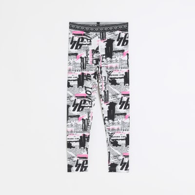 Girls Black RI Newspaper print Leggings River Island